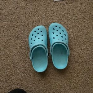 Teal crocs